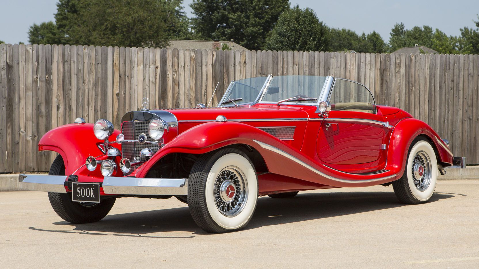 1934 Mercedes 500K parked outside