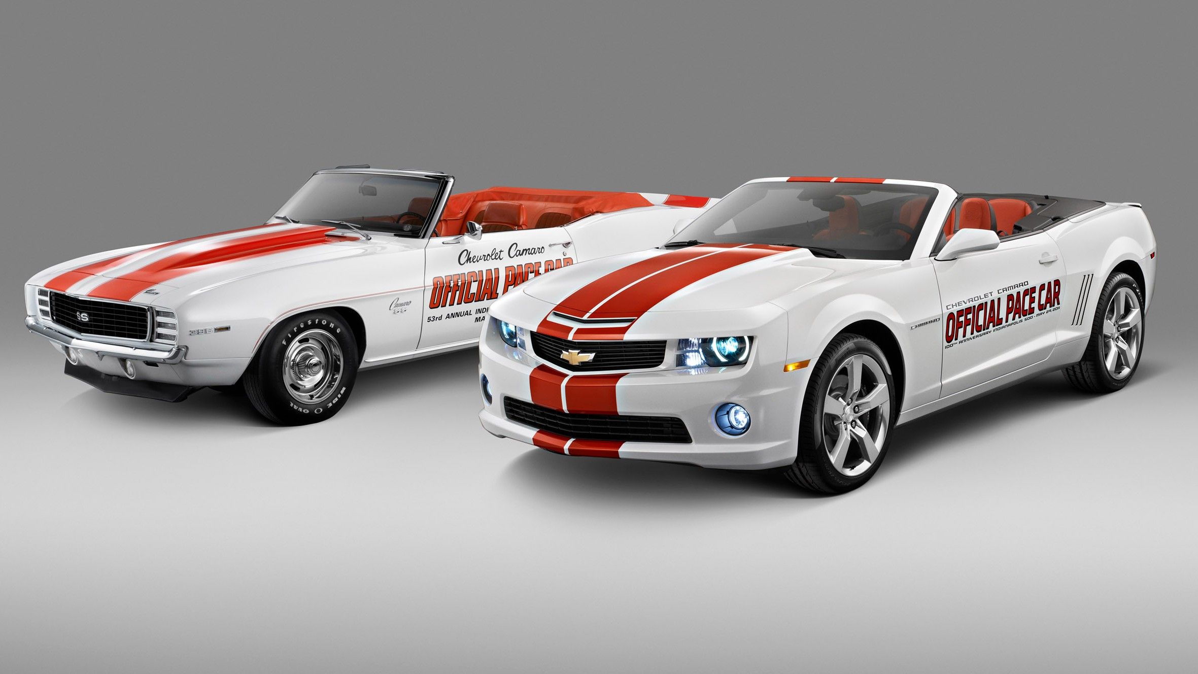 2 white 1969 and 2011 Chevrolet Camaro SS PaceCar