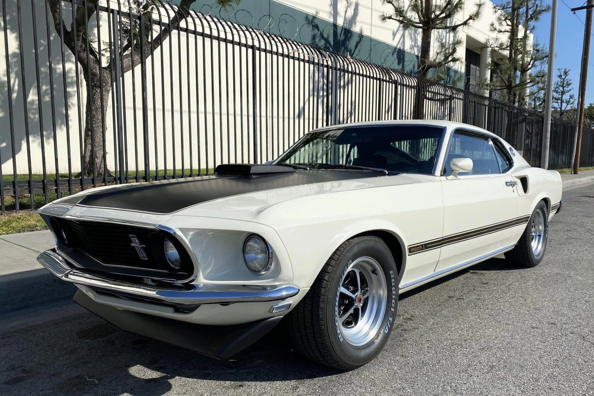 A parked 1969 Ford Mustang Mach I Cobra Jet