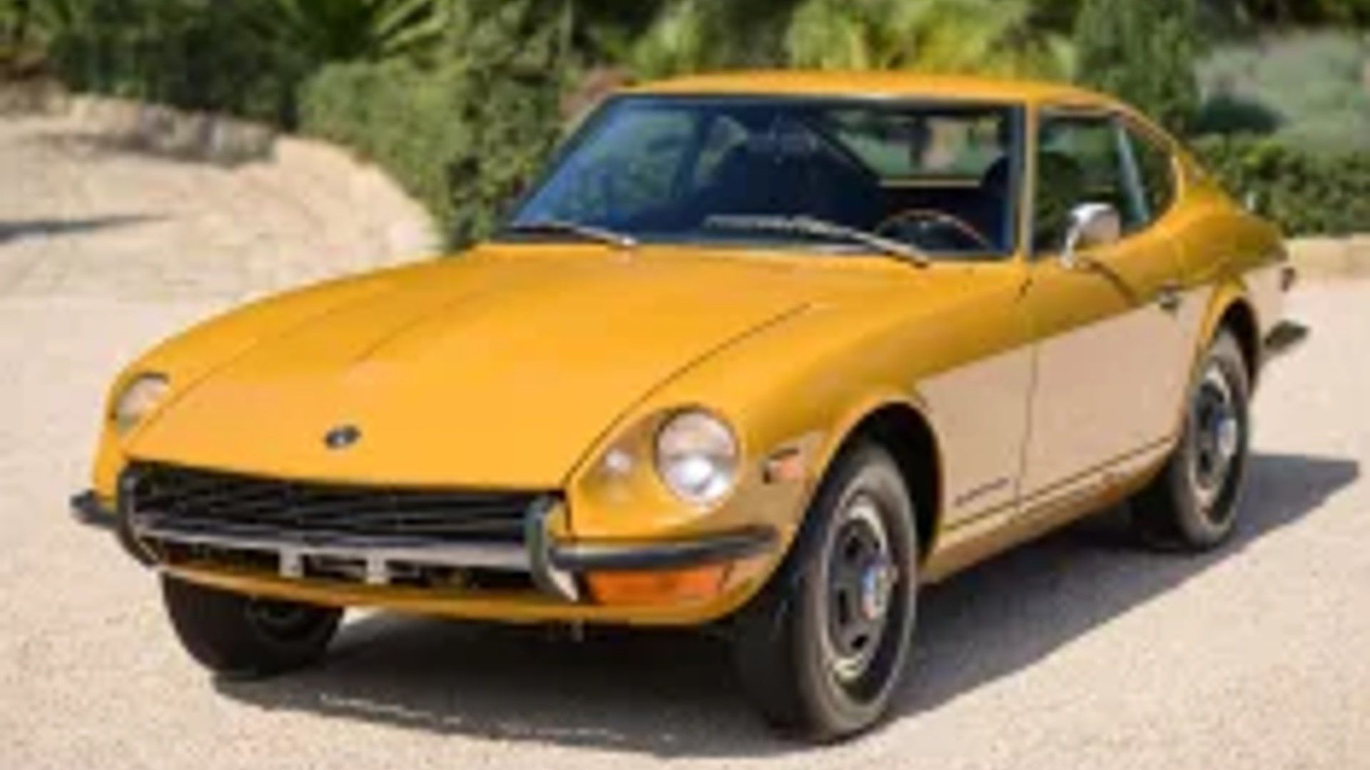 Shot of a golden Nissan Fairlady Z. 