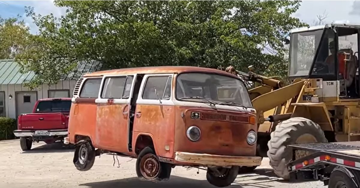 Front View: VW Bus Getting Loaded Onto A Trailer, rusty