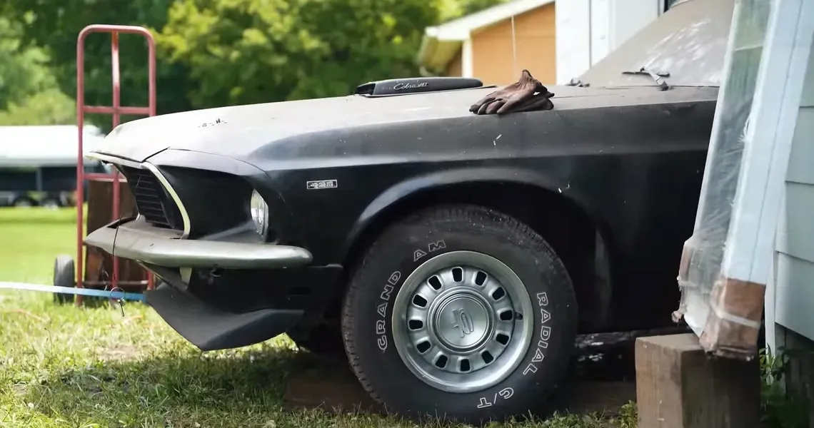 Barn Find 1969 Black Ford-Mustang-Super-Cobra-Jet-428-Via-YouTube-via-Dennis-Collins