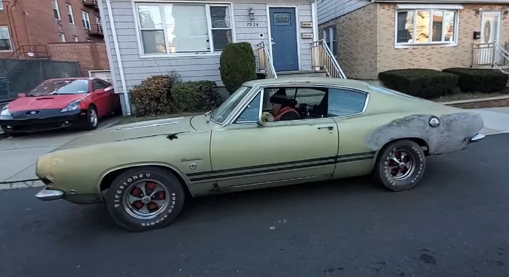 Owner Benny starting his 1968 Plymouth Barracuda Formula S