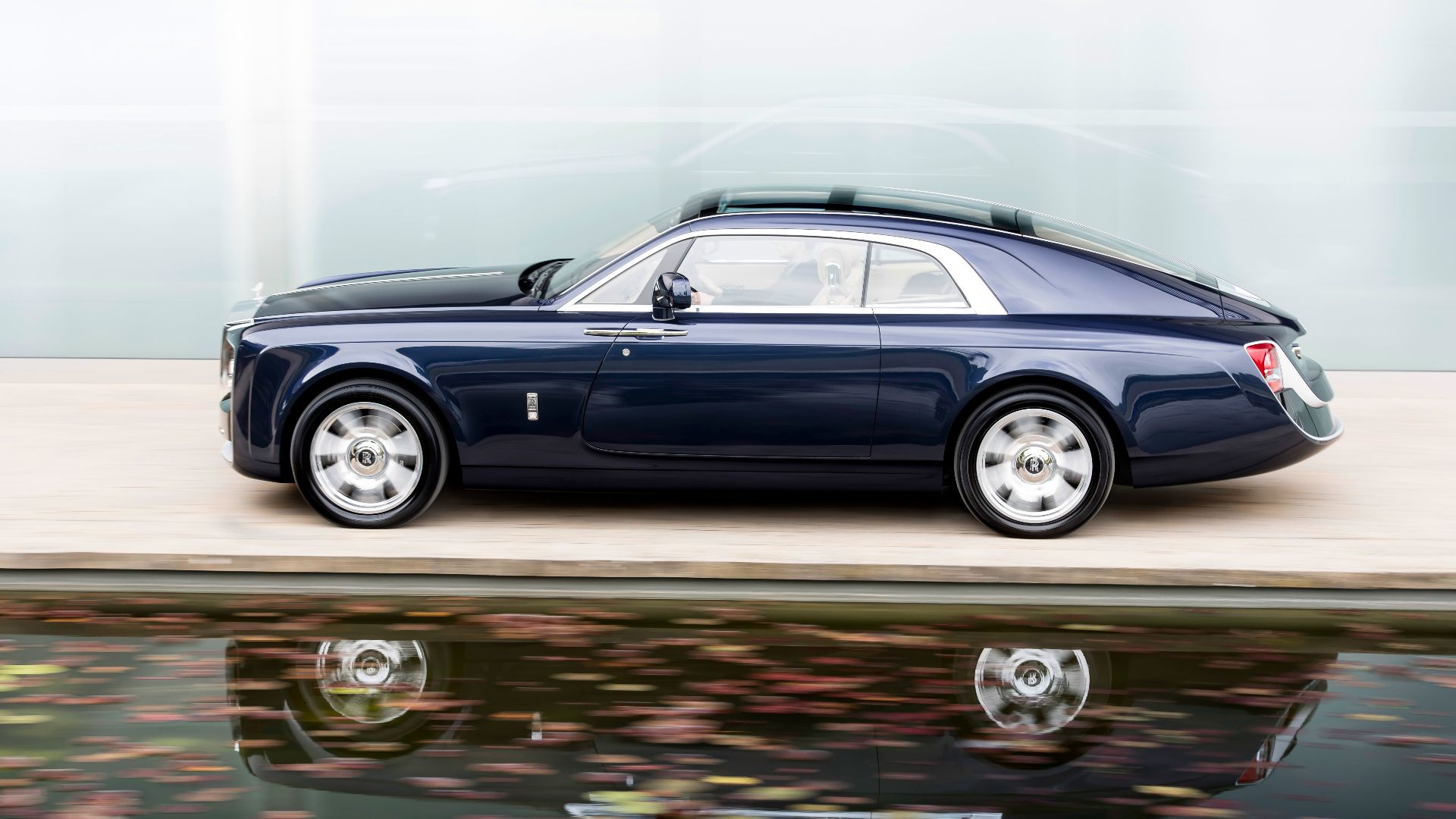 Navy blue Rolls Royce Sweptail